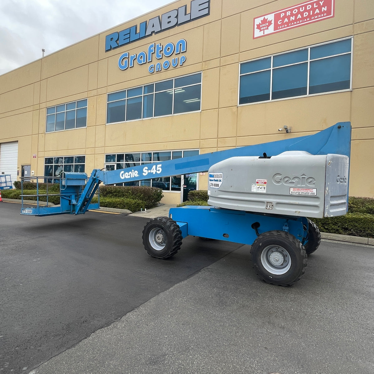 2002 Genie Boom Lift S45 for sale Picture of the whole machine in down position ships to canada and usa